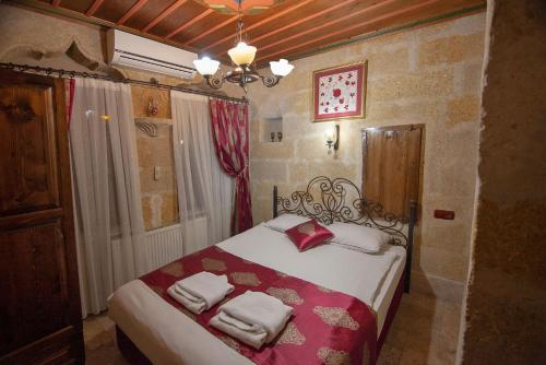 Letto o letti in una camera di Center Cave House