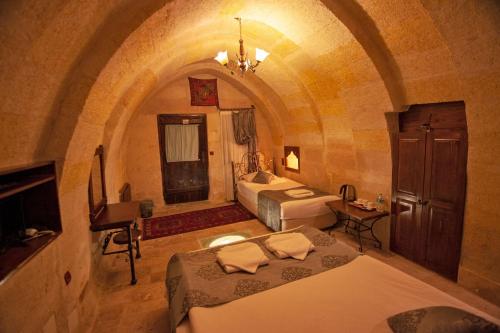 Letto o letti in una camera di Center Cave House