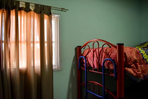 En eller flere senge i et værelse på Cabañas de la bodega Romano-Pin