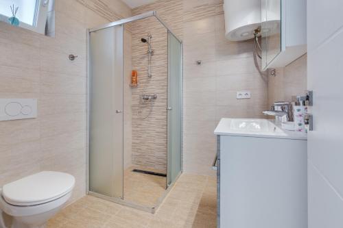 Kúpeľňa v ubytovaní Apartmani Kaštelina