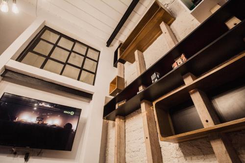 TV a/nebo společenská místnost v ubytování Casa Basilico