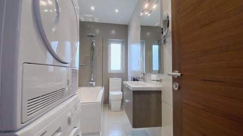 Et badeværelse på Quisisana Apartments - Cast Renting