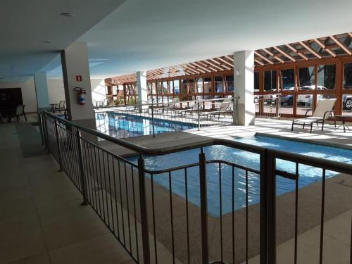 a view of a swimming pool in a building at Cond VISTA AZUL in Pedra Azul