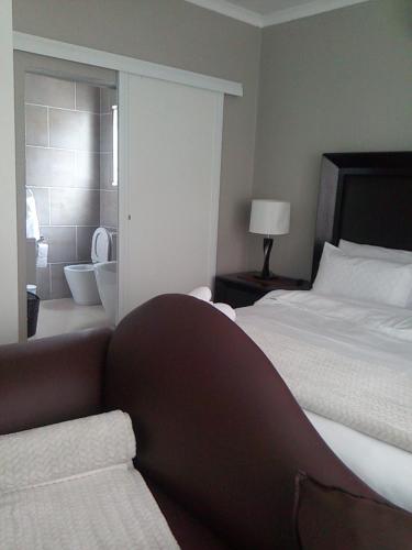 Letto o letti in una camera di Tlelakufuma Guest House