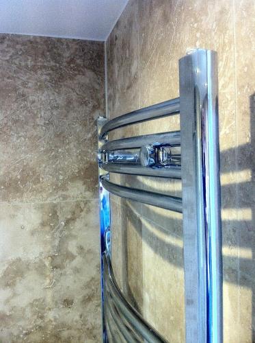 a corner of a room with a refrigerator at Bridge Hotel Brandon in Brandon