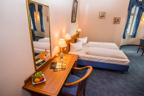 Katil atau katil-katil dalam bilik di Golfhotel Denzerheide