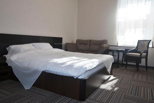 
Кровать или кровати в номере Д-Отель Тверская 
