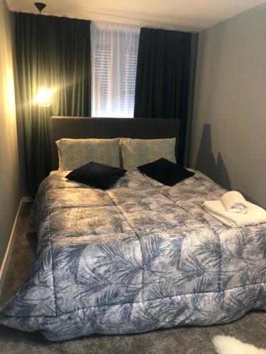 Кровать или кровати в номере VERACI Apartments