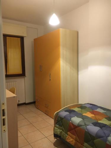 Postel nebo postele na pokoji v ubytování Residence KATIA