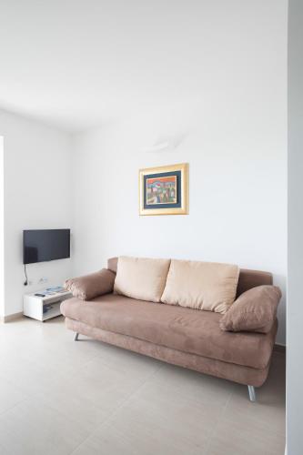 TV a/nebo společenská místnost v ubytování Apartments Lofiel