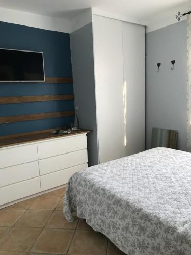 Ένα ή περισσότερα κρεβάτια σε δωμάτιο στο L'atelier des Coudelières