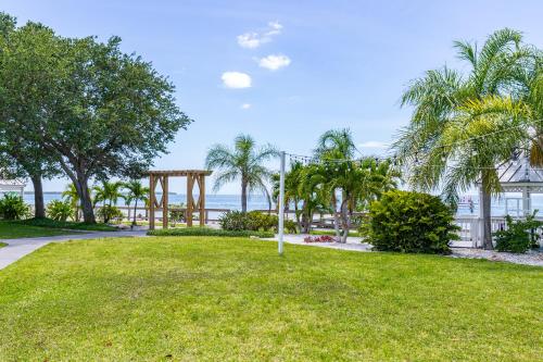 a park with palm trees and a playground at The Blue Lagoon in Ruskin