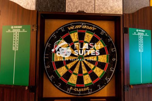 a dart board with a face in the middle at Windmill Upon Hills Premium Suites Genting Highland in Genting Highlands