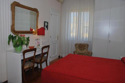 Postel nebo postele na pokoji v ubytování Attico Monteverde