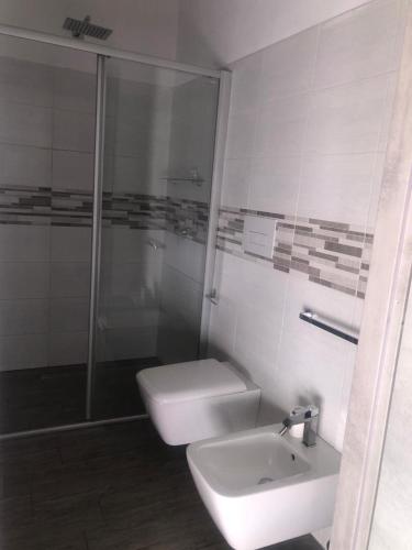 Ένα μπάνιο στο Antica Campione Rooms & Hostel