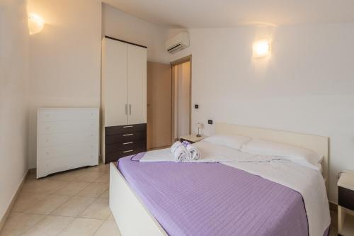 Katil atau katil-katil dalam bilik di Residence Holidays