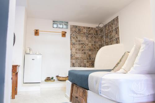 Katil atau katil-katil dalam bilik di Mascot Garden Rooms