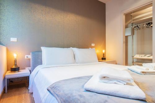Una cama o camas en una habitación de Milan Retreats Duomo