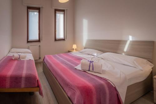 Katil atau katil-katil dalam bilik di Residence Holidays