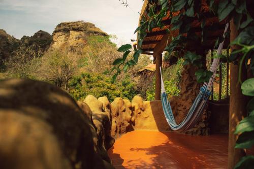 a view of a playground with a swing at Hotel Valle Místico in Tepoztlán