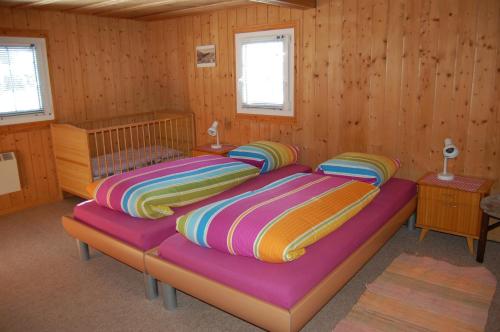 Postel nebo postele na pokoji v ubytování Casa Gion Giusep
