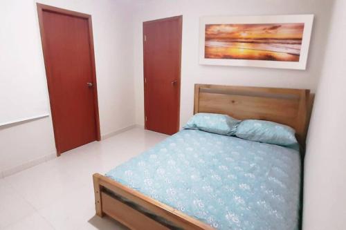 Postel nebo postele na pokoji v ubytování Chipipe Salinas Beach Apartment w Parking
