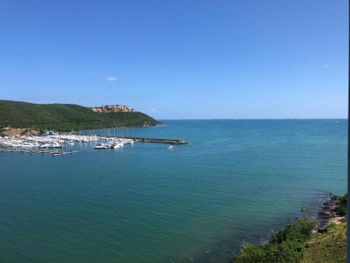 a view of a harbor with boats in the water at Waterfront studio at Fajardo, Puerto Rico in Fajardo
