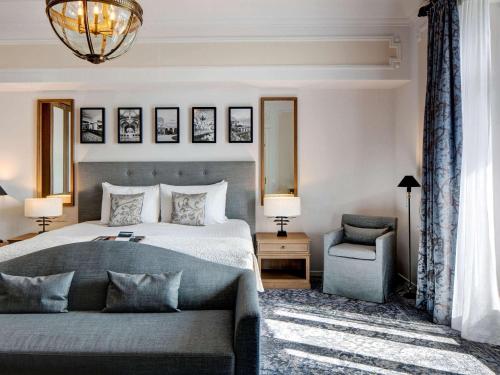 Ένα ή περισσότερα κρεβάτια σε δωμάτιο στο Fairmont Le Montreux Palace