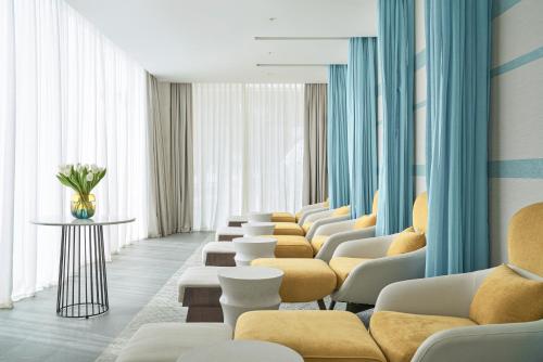 a waiting room with a row of chairs at The Secret Con Dao in Con Dao