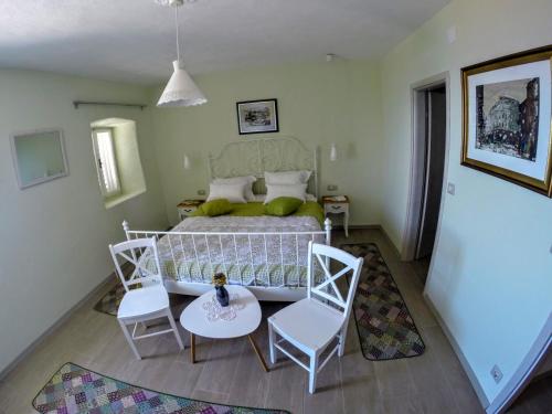 Ένα ή περισσότερα κρεβάτια σε δωμάτιο στο Holiday house with private pool Mokalo