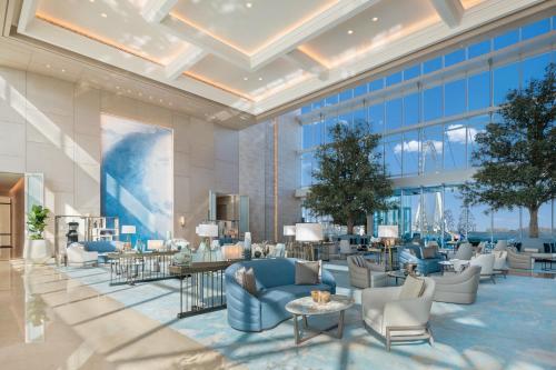 a rendering of the lobby of the trump international hotel casino at Address Beach Resort in Dubai
