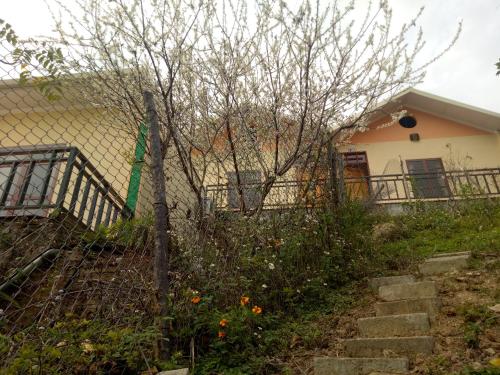 a fence in front of a house at Hoa Lan Hotel in Bak Kan