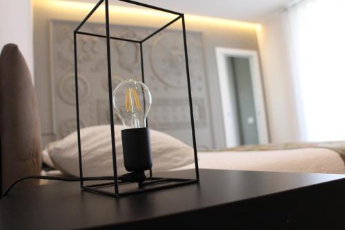 a light bulb sitting on top of a table at Il Cavaliere Bed and Breakfast in Caserta