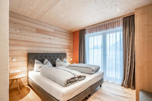 Posteľ alebo postele v izbe v ubytovaní Naturhaus am Arlberg