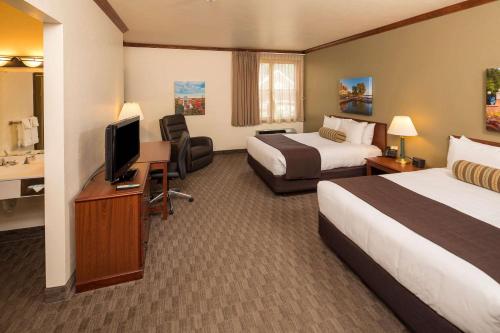 En eller flere senge i et værelse på Kress Inn, Ascend Hotel Collection