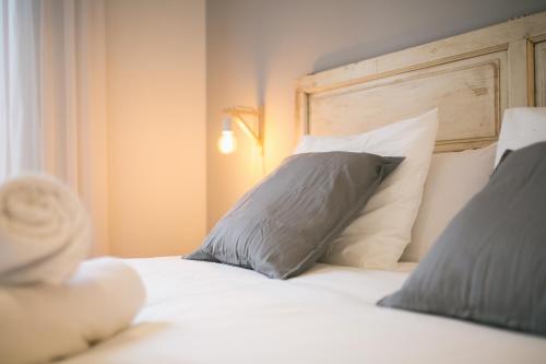 Ένα ή περισσότερα κρεβάτια σε δωμάτιο στο Apartaments Santa Clara – Baltack Homes