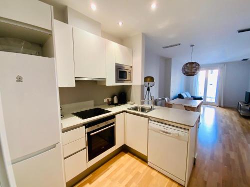 Η κουζίνα ή μικρή κουζίνα στο Apartaments Santa Clara – Baltack Homes