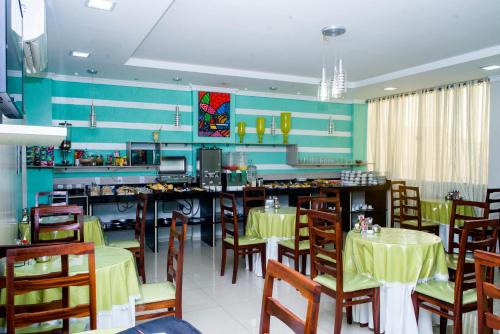 A restaurant or other place to eat at Hamara Soft Hotel 2