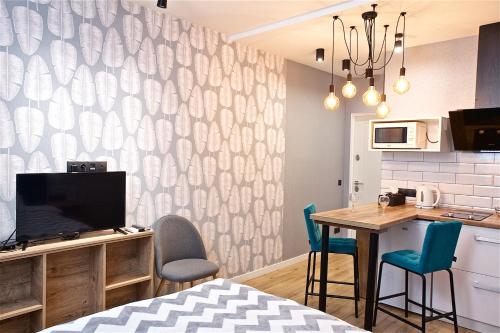 Кухня или мини-кухня в Allurapart Inn MVZ, Левобережная МВЦ
