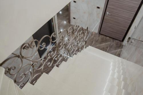 a bathroom with a mirror and a white sink at Miryam House Affittacamere Suite e Relax in San Severo