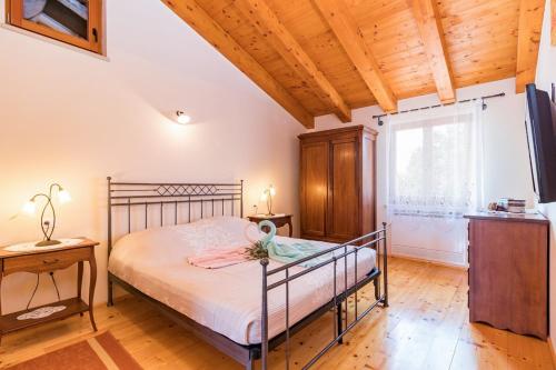 Postel nebo postele na pokoji v ubytování Villa Anita