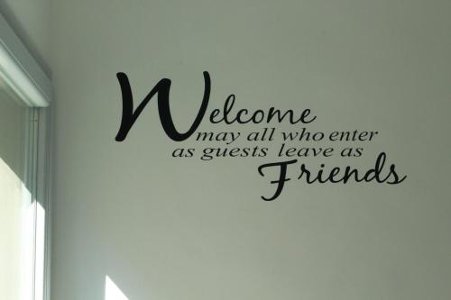 a welcome may all who enter as guests leave as friends wall sticker at la casa in Ancona in Ancona