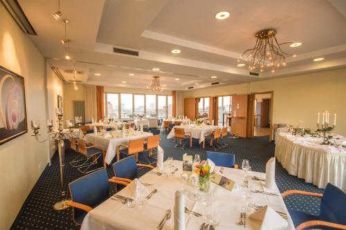 Un restaurante u otro lugar para comer en Ringhotel Drees