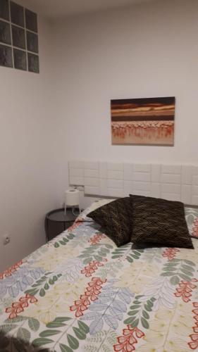 A bed or beds in a room at apartamento Canary Style 2 las canteras