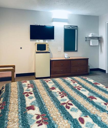 Kuchyň nebo kuchyňský kout v ubytování Century 21 Motel