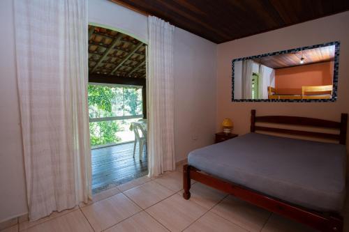 Cama o camas de una habitación en Chácara c piscina churrasqueira e Wi-Fi em Ibiúna