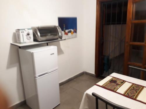 Una cocina o kitchenette en Departamentos Maryan