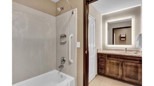 A bathroom at Staybridge Suites Salt Lake-West Valley City, an IHG Hotel