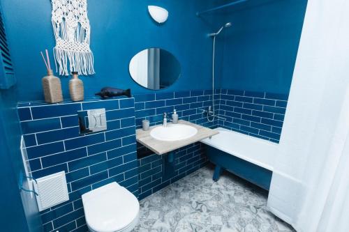 Kylpyhuone majoituspaikassa EtazhiDaily in Malevich