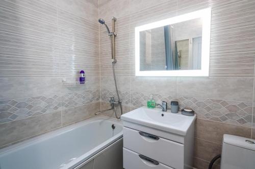 Ванна кімната в Квартира в стиле ЛОФТ у Камы